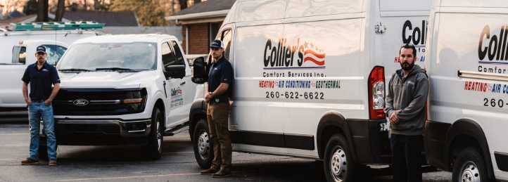 Three Collier's Comfort Services Heating, Cooling, Plumbing & Electrical Techs standing in front of their service vans.